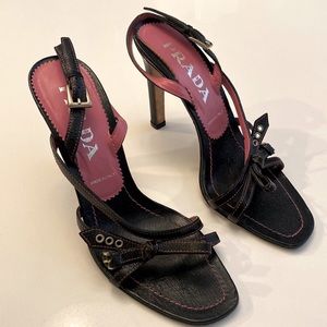 Prada.  Navy and pink bow high heels